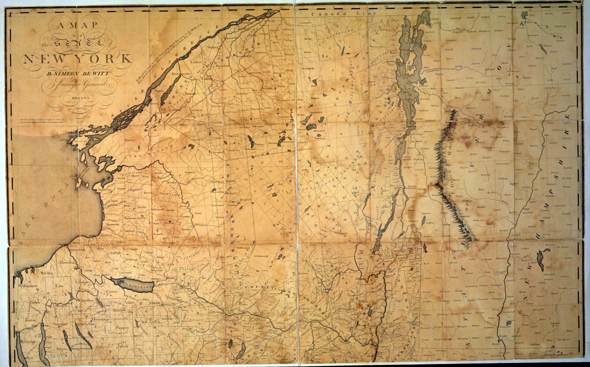 Simeon De Witt's 1802 map of the State of New York. The northern half of the
            state is laid out in numbered survey townships across Macomb's Purchase,
            between the St. Lawrence River, Lake Ontario and Lake Champlain; to the south
            the Military Tract carries classical town names such as Homer, Cicero, Ovid
            and Romulus.